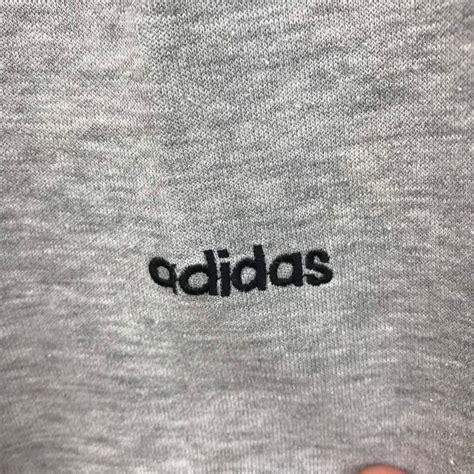 adidas schwarz mit altem logo streifen|Adidas logo 3 blätter.